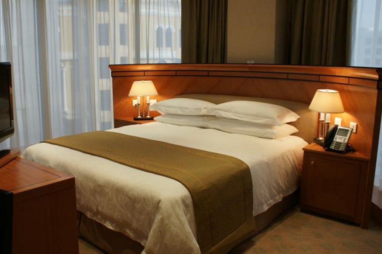 Wiseman Grand Hotel Dauhá Exteriér fotografie A bed